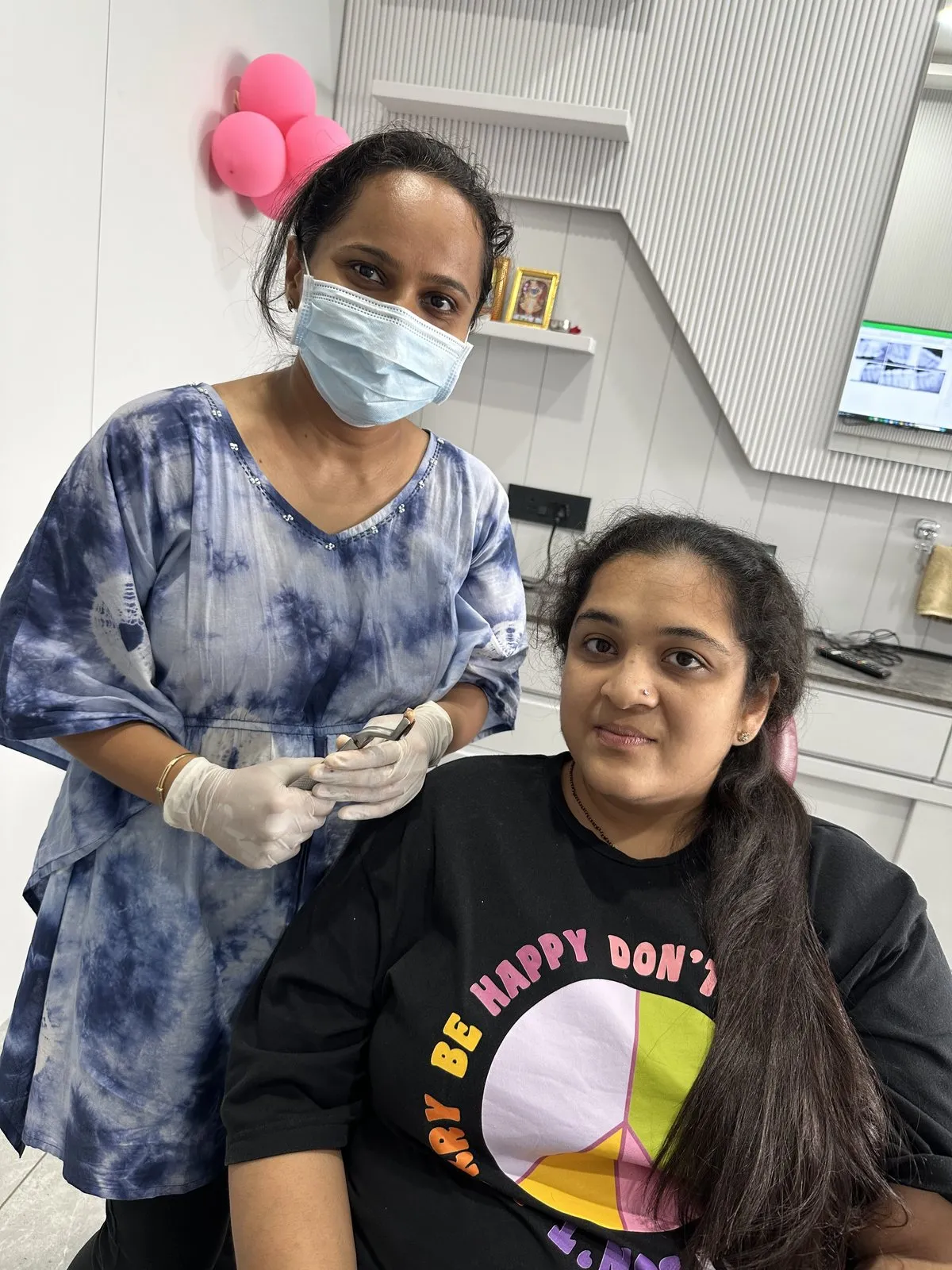 Dr. Rima Shah with a patient before treatment at Anaya Dental Clinic